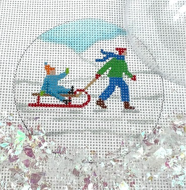 Child Pulling Toddler on Sled Ornament w/Clear Dome and Confetti