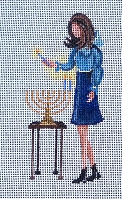 Girl Lighting Menorah
