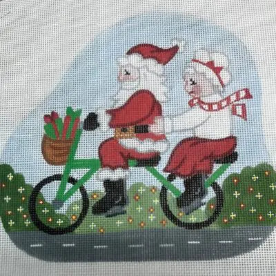 Santa and Mrs. Claus Riding a Bike (Cheryl & Annie)