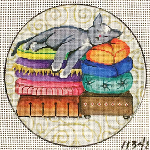 Round Kitty on Pillows