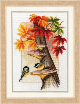 Chickadees Between Leaves